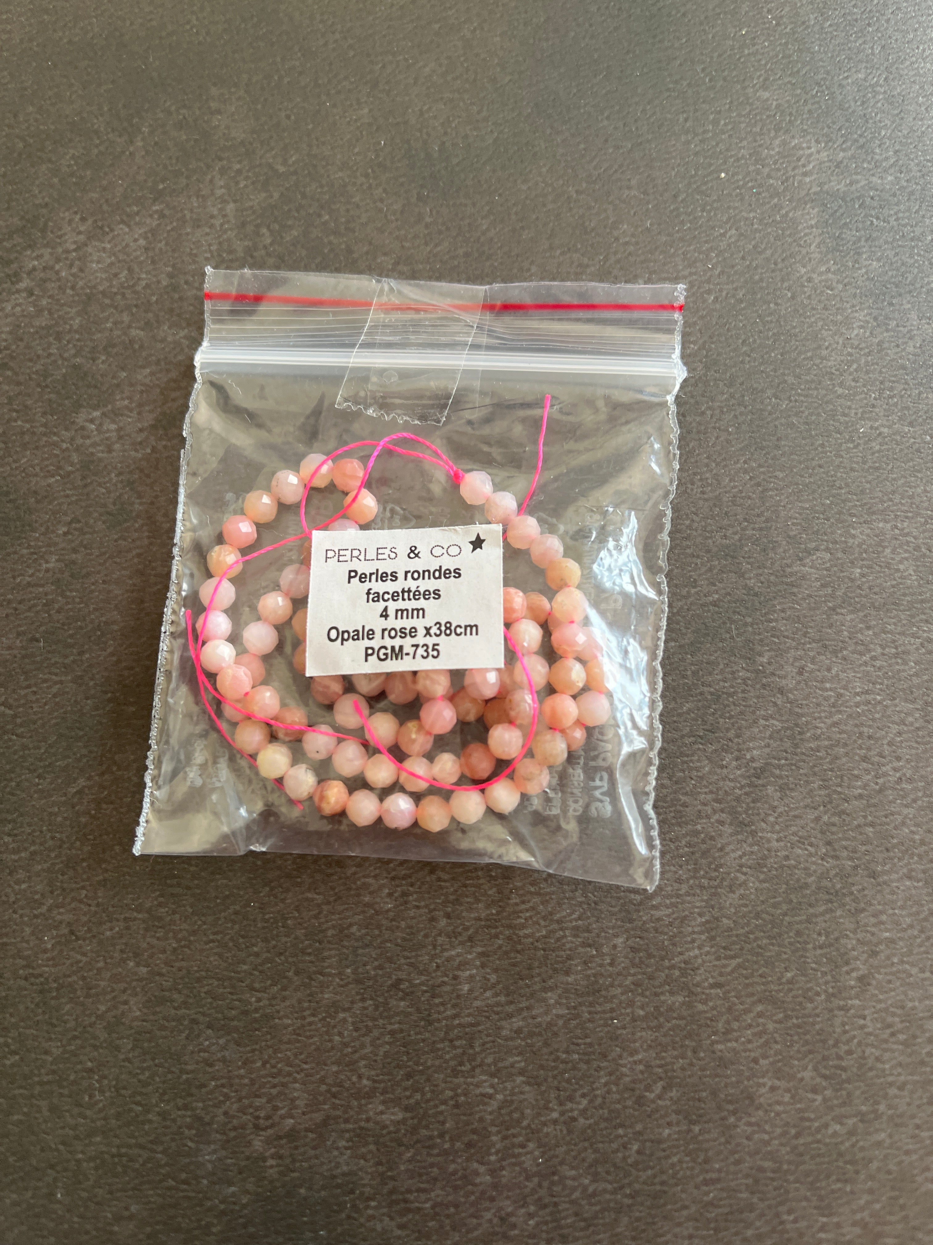 1 fil Opale rose facettes 4mm
