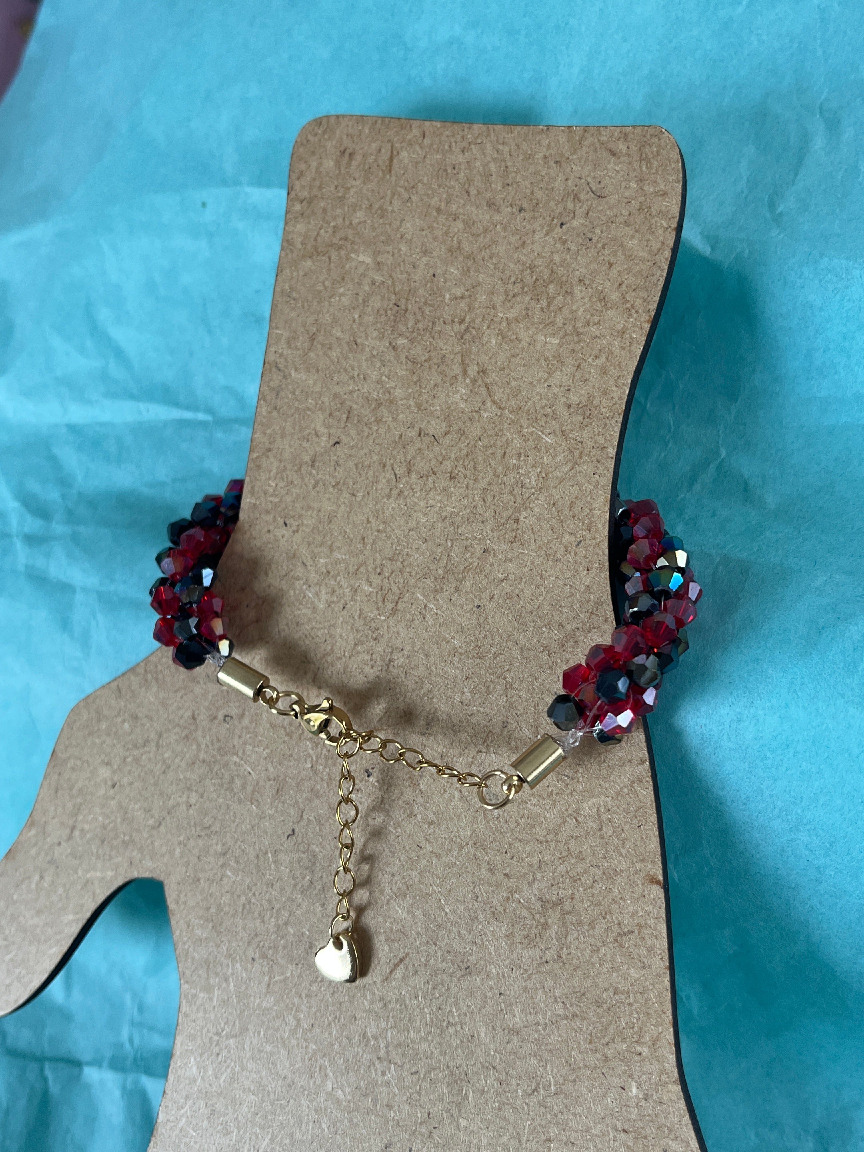 Bracelet rouge et noir reflets caméléon