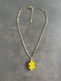 Collier pampille puzzle jaune paillettes