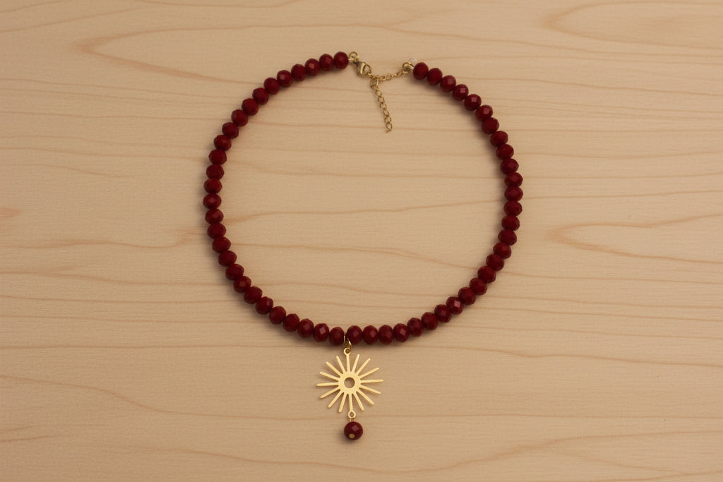 Collier rouge et soleil