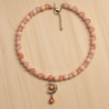 Collier orange lune