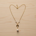 Collier pendentif beige marbré