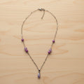 Collier violet à facettes