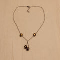 Collier perles dorées avec reflets