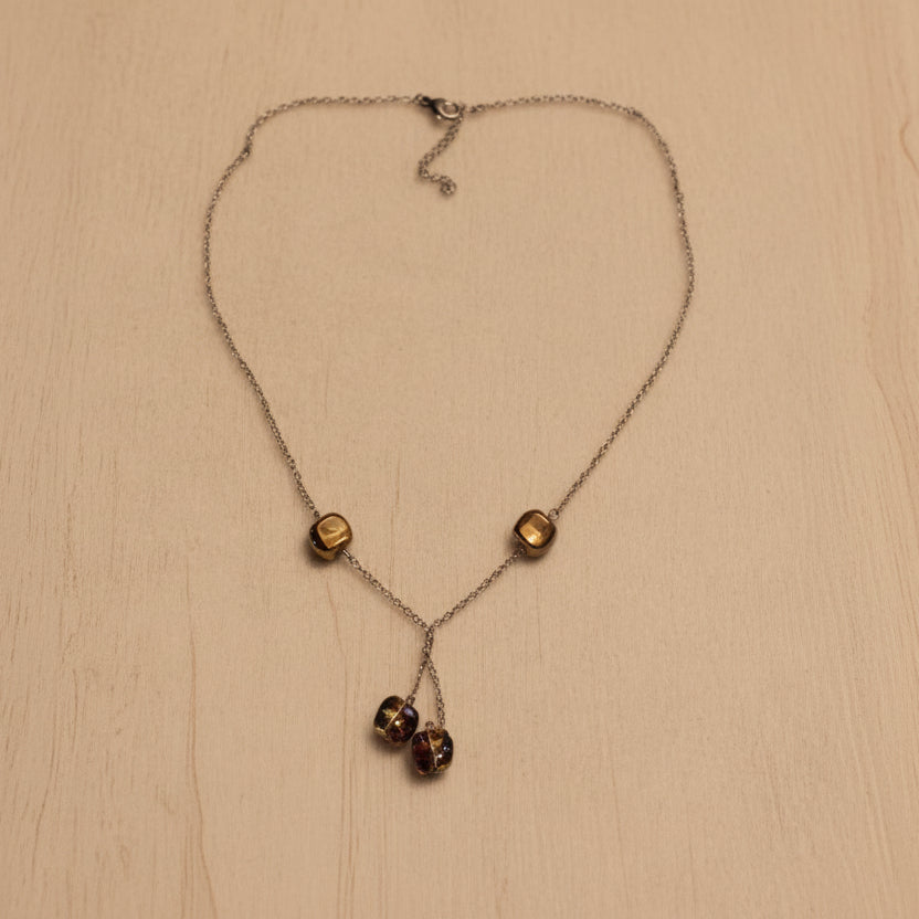 Collier perles dorées avec reflets