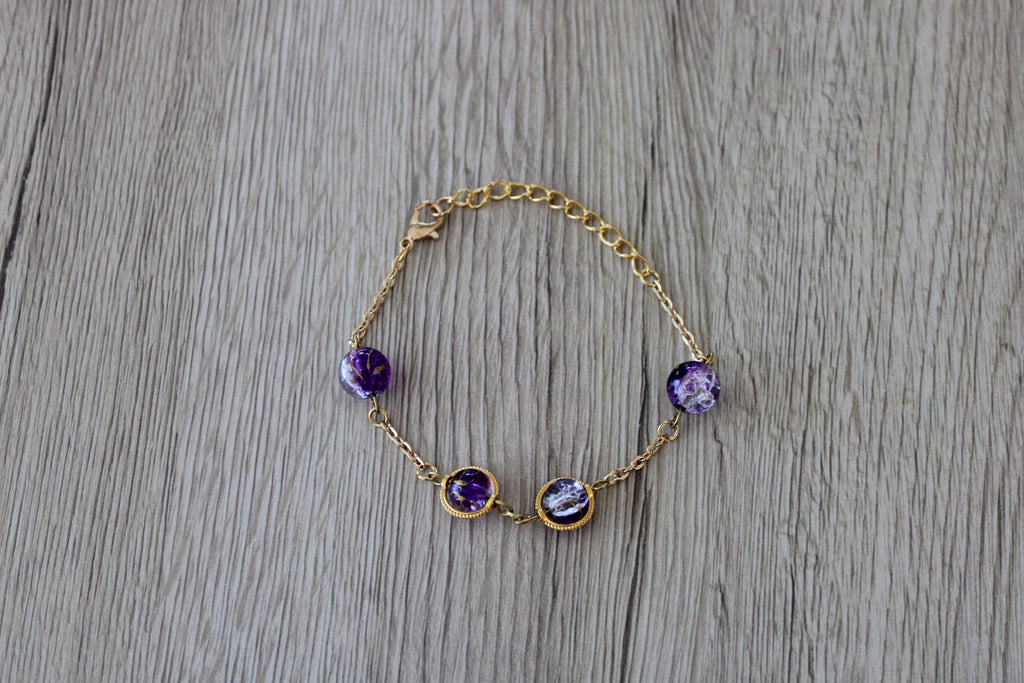 Bracelet perles en verre violet et doré