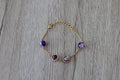 Bracelet perles en verre violet et doré
