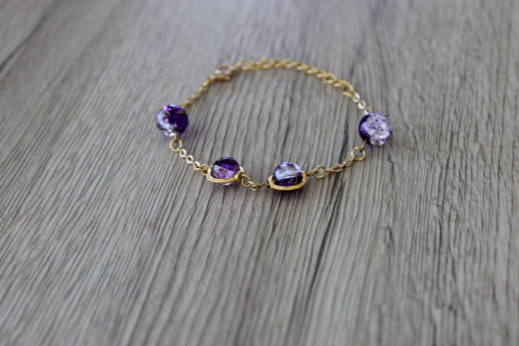 Bracelet perles en verre violet et doré