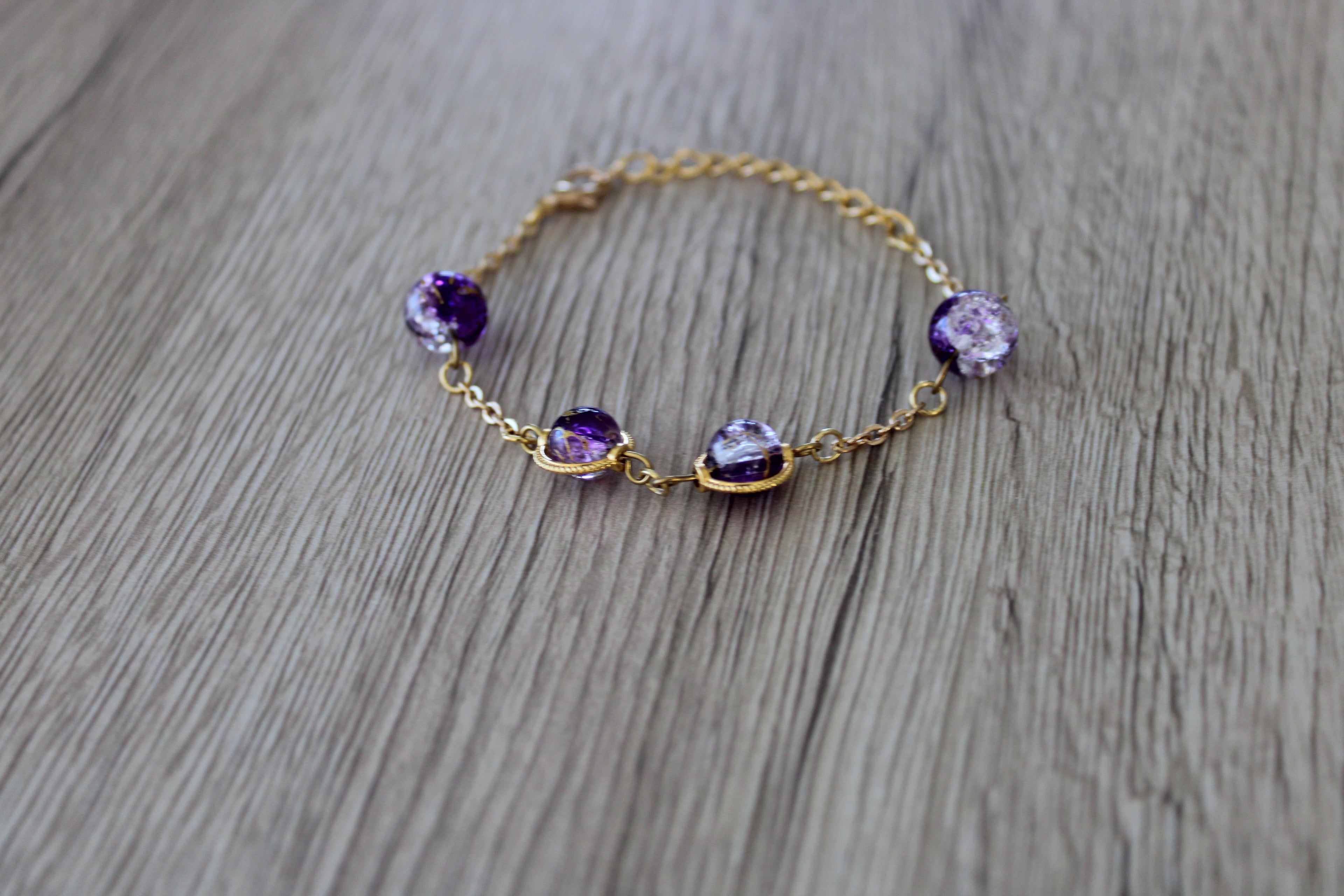 Bracelet perles en verre violet et doré