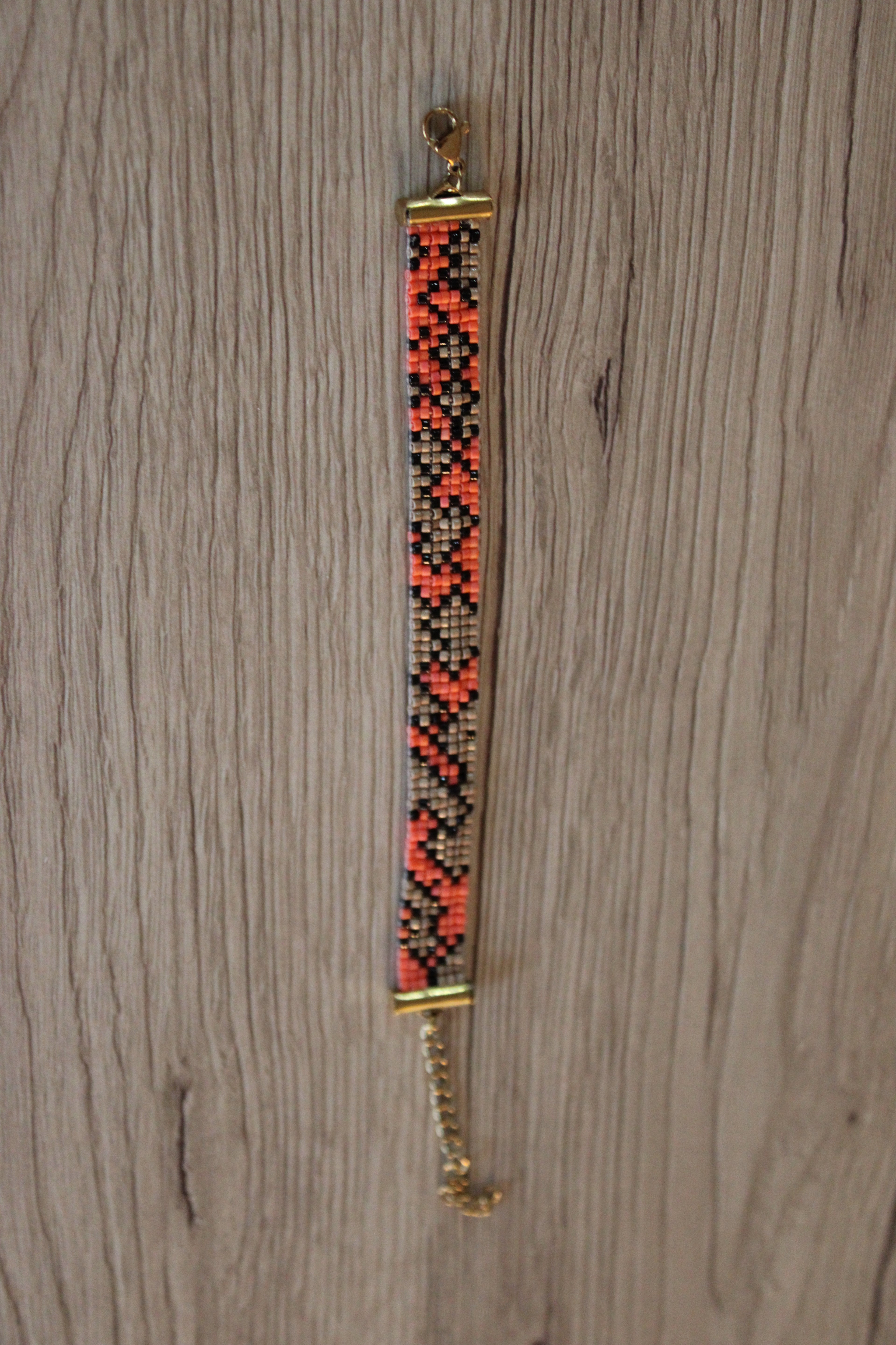 Bracelet motifs asymétriques orange et caramel