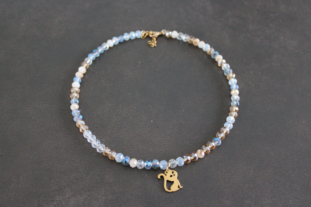 Collier bleu transparent champagne chat doré