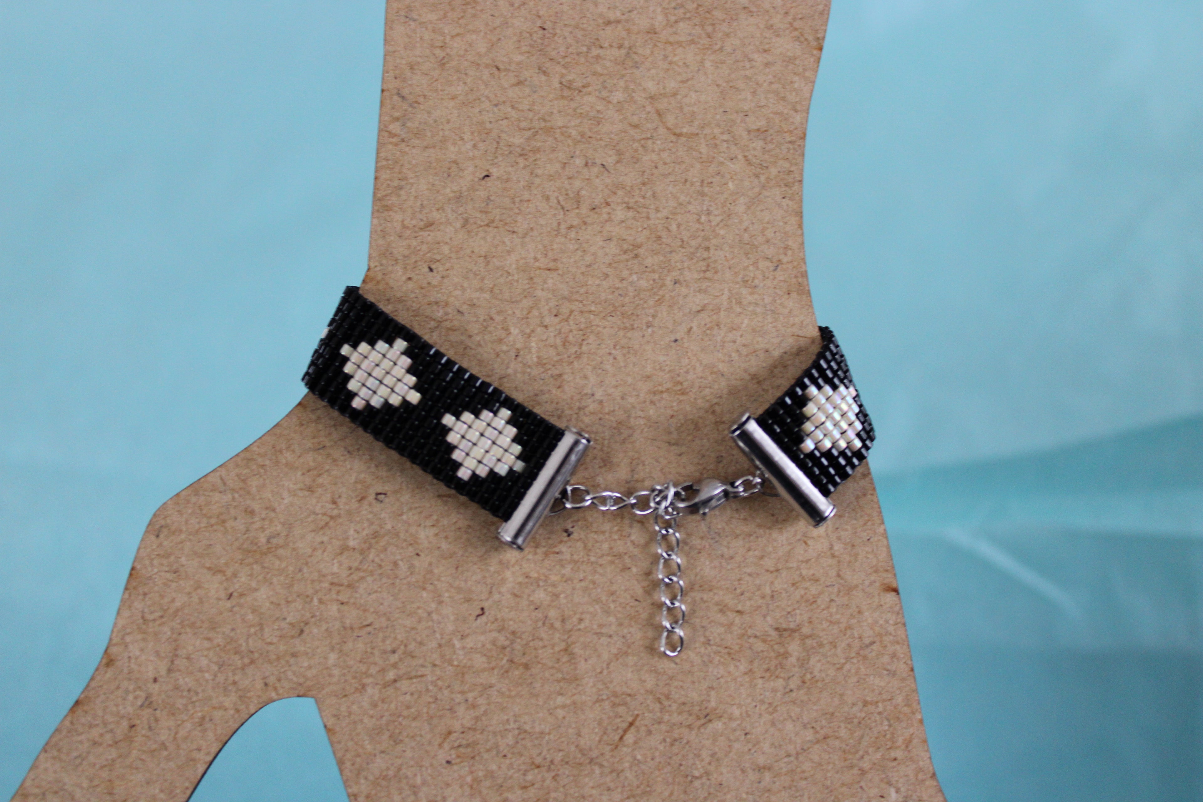 Bracelet noir losanges crème