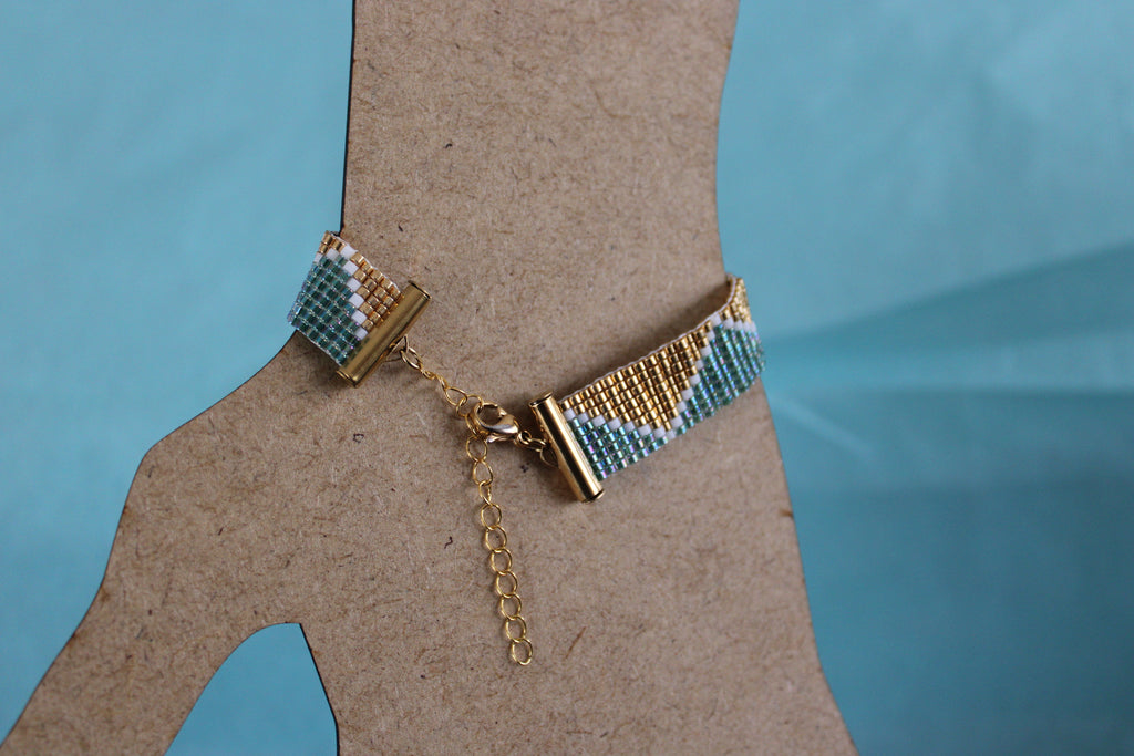 Bracelet triangle vert et doré