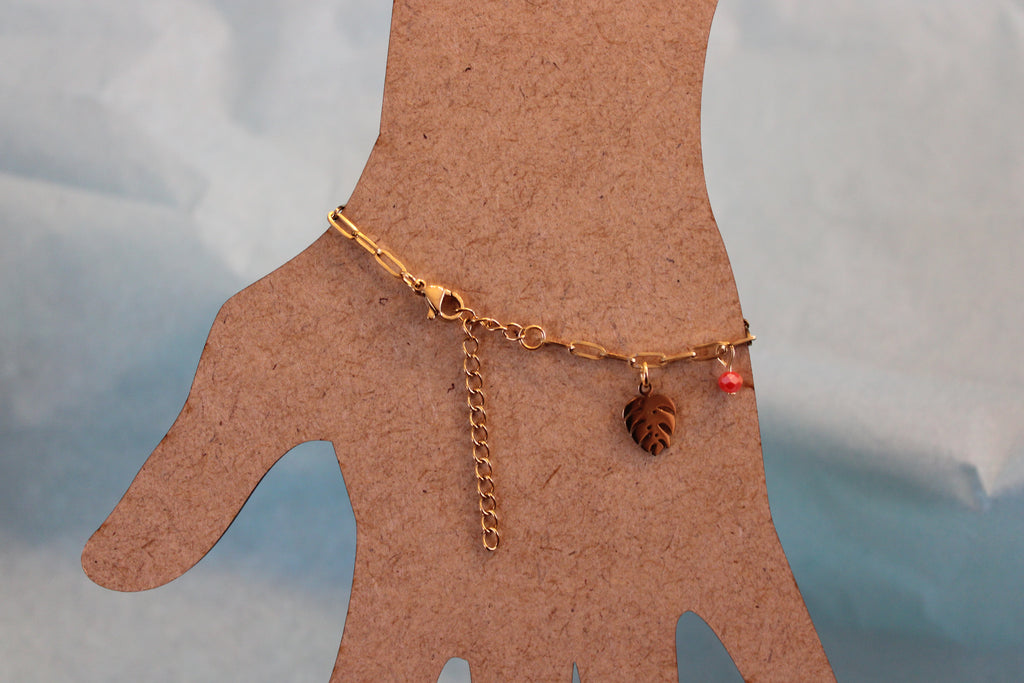 Bracelet breloques et perles roses